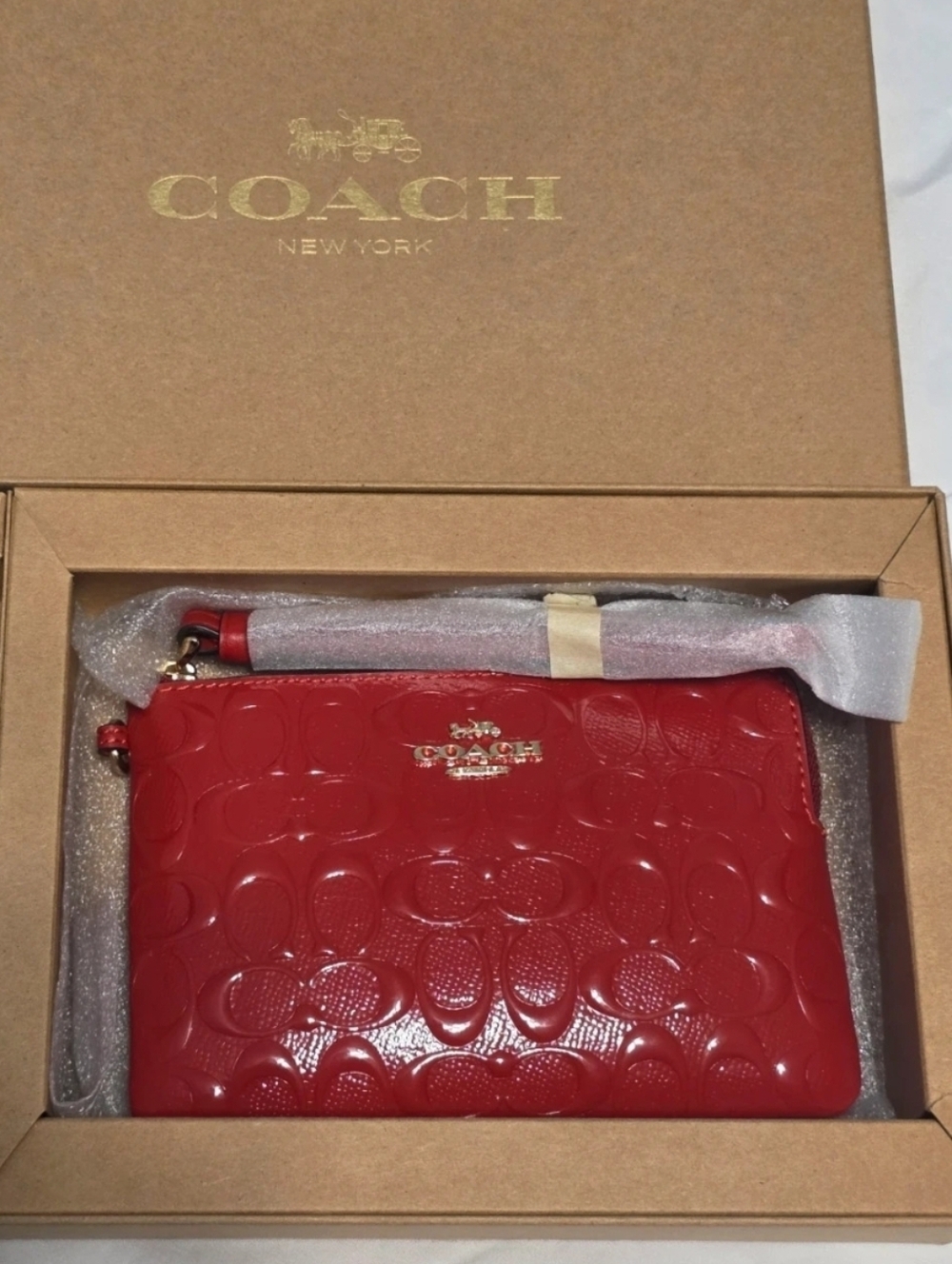 Coach Boxed Corner Zip Wristlet In Signature